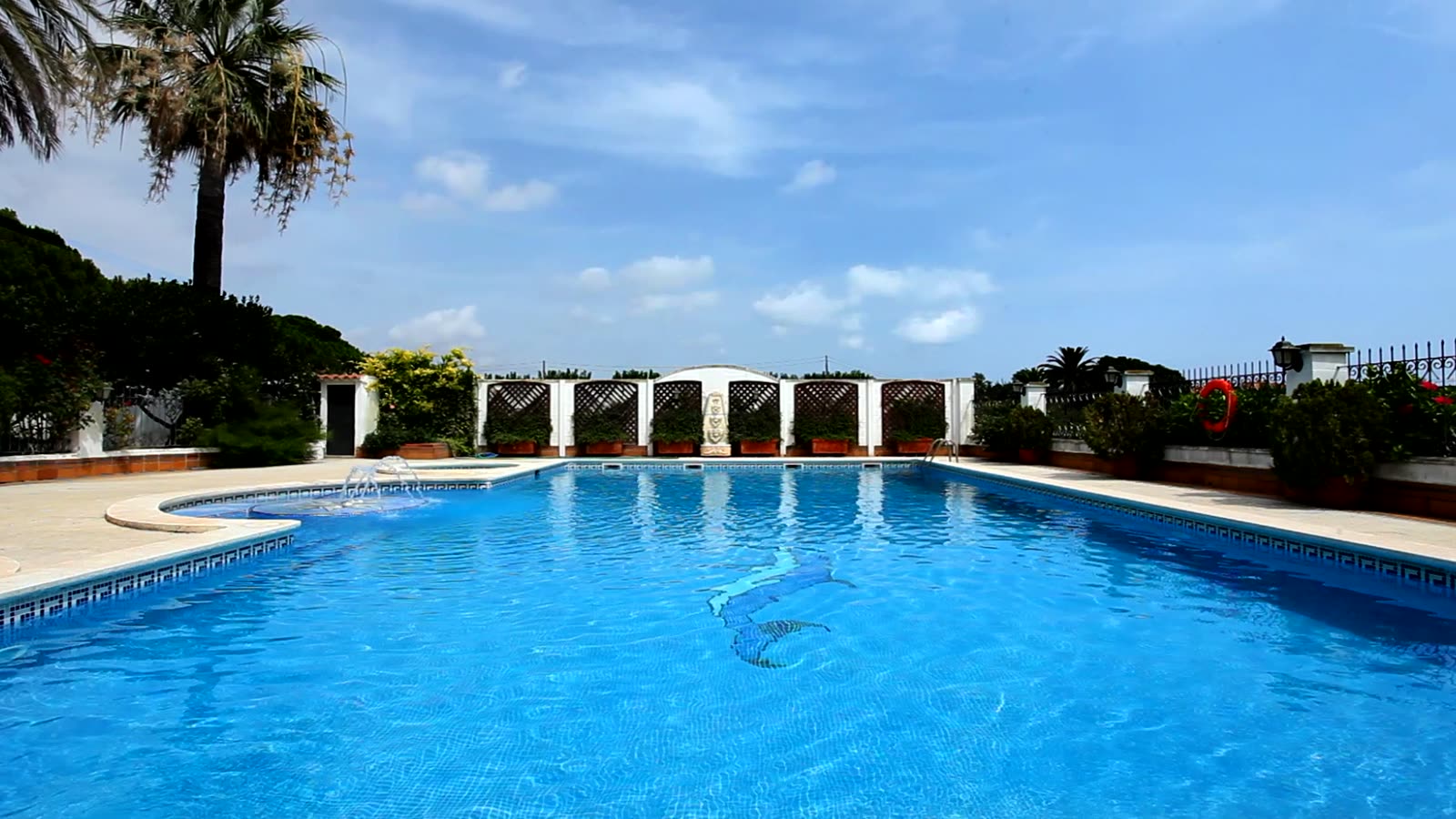 The compound's clubhouse pool on a sunny day